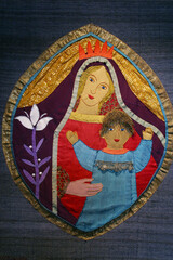 Virgin Mary with baby Jesus, tapestry in the chapel in Lichtenburg, Nals, Italy