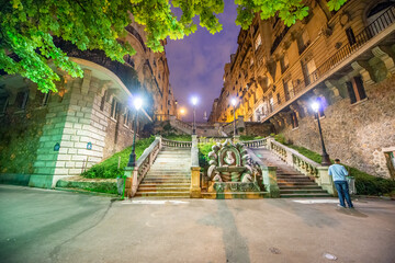 Night view of ancient stairs in Paris.