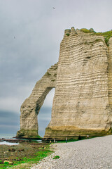 Amazing cliffs and arch of Etretat, France.