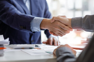 Financial Business handshake for teamwork of business merger and acquisition, successful negotiate, hand shake, two businessman shake hand with partner to celebration partnership business deal concept