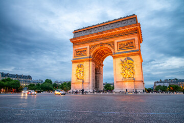 Night view of Triumph Arch and Etoile Roundabout in Paris, France