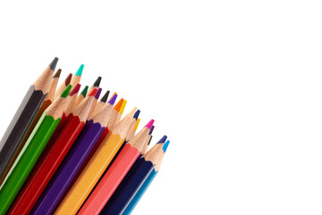 Many multicolored pencils, isolated on white background with copy space. Art and education background.