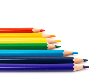 Many multicolored pencils, isolated on white background with copy space. Art and education background.