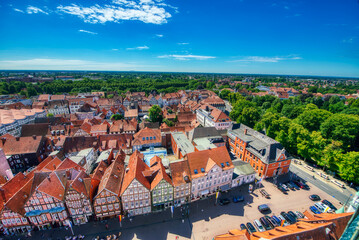 Fototapeta na wymiar Celle, Germany - July 18, 2016: Aerial view of medieval city streets on a summer day.