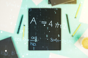 Double exposure of creative scientific formula concept and digital tablet on background, top view, research and development concept