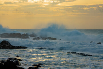 sunset at the stormy beach of Albion in the west of the republic of Mauritius.