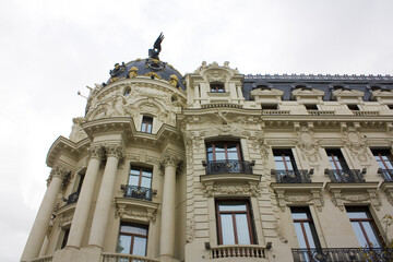 Fototapeta na wymiar Beautiful historical building at Gran Via of Madrid, Spain