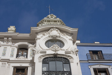 Fototapeta na wymiar Beautiful historical building at Mayor Street in Madrid, Spain