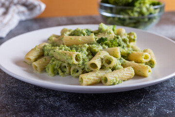 Creamy macaroni pasta with cheese and broccoli. Quick and easy vegetarian recipe.