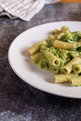 Creamy macaroni pasta with cheese and broccoli. Quick and easy vegetarian recipe.