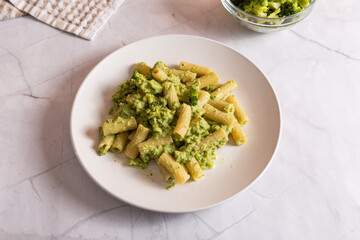 Creamy macaroni pasta with cheese and broccoli. Quick and easy vegetarian recipe