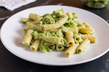 Creamy macaroni pasta with cheese and broccoli. Quick and easy vegetarian recipe.