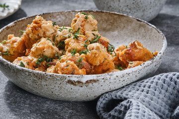 Fried meatballs with spices, thyme and cream sauce. Shallow depth of field