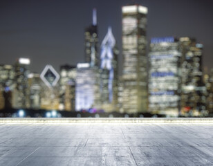 Empty concrete dirty rooftop on the background of a beautiful blurry Chicago city skyline at night, mockup