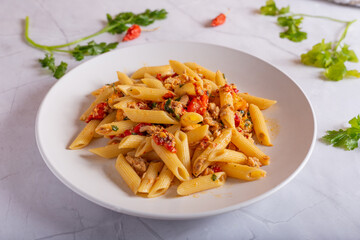Penne with tuna and peppers. Easy and quick recipe typical of Mediterranean cuisine