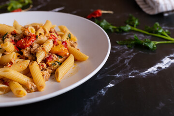 Penne with tuna and peppers. Easy and quick recipe typical of Mediterranean cuisine