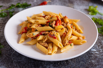 Penne with tuna and peppers. Easy and quick recipe typical of Mediterranean cuisine