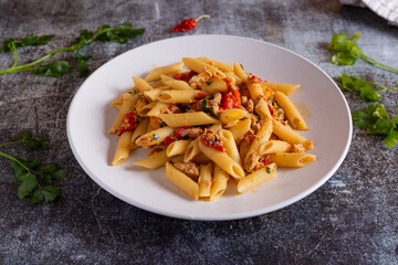 Penne with tuna and peppers. Easy and quick recipe typical of Mediterranean cuisine
