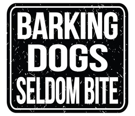 BARKING DOGS SELDOM BITE, words on black stamp sign