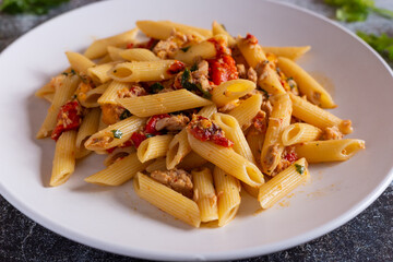 Penne with tuna and peppers. Easy and quick recipe typical of Mediterranean cuisine