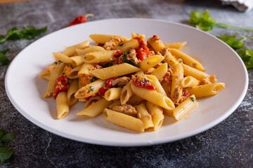 Penne with tuna and peppers. Easy and quick recipe typical of Mediterranean cuisine