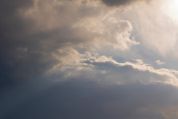 A sunbeam through the clouds. Dramatic sky. Natural background. - 488574177