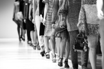 Models walking a catwalk during a fashion show