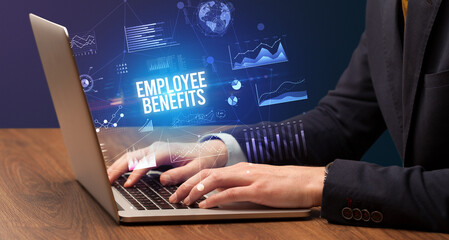 Businessman working on laptop, business concept