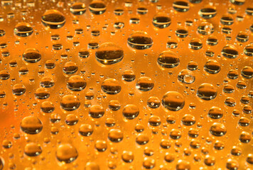 yellow water droplets background .close up