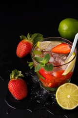 Strawberry mojito. Refreshing summer drink with berries, lime and mint