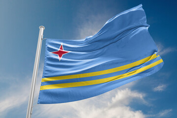 Aruba Flag is Waving Against Blue Sky