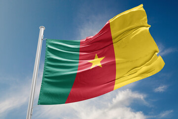 Cameroon Flag is Waving Against Blue Sky