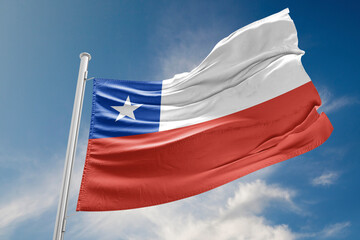 Chilian Flag is Waving Against Blue Sky
