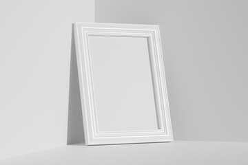 Rectangular photo frame on floor in corner diagonal view