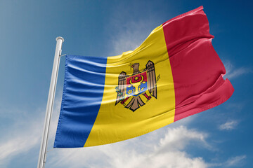 Moldova Flag is Waving Against Blue Sky