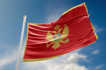 Montenegro Flag is Waving Against Blue Sky