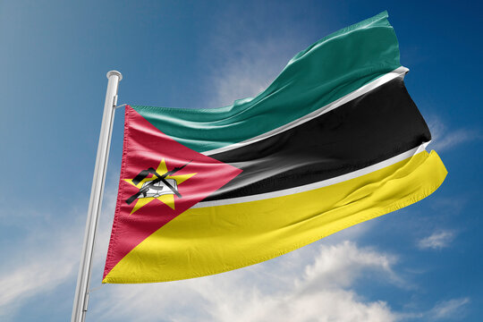 Mozambique Flag is Waving Against Blue Sky