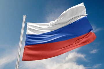 Fototapeta na wymiar Russia Flag is Waving Against Blue Sky