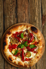 pizza vegetables tomato, onion, pickles, mushrooms, etc. vegan or vegetarian food ready to eat no meat portion on the table for healthy meal snack outdoor top view copy space food background rustic