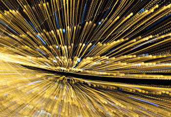 Festive lights in motion as an abstract background.