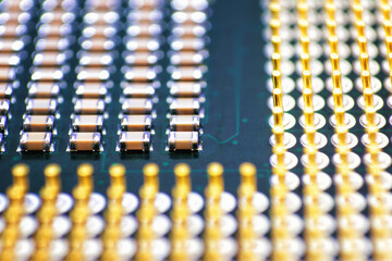 cpu gold pins and chip, microchip processor legs computer component technology. Macro photography...