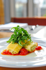 A Dish Baked Herb Cheese Rolls with tomato sauce