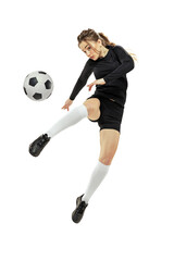 Leg kick. One sportive girl, female soccer player training with football ball isolated on white studio background. Sport, action, motion, fitness © master1305