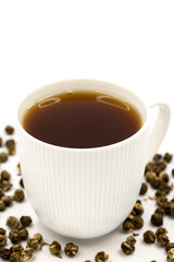 Jasmine Pearls Green Tea on a white background. medicinal asian herbal tea