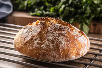 Freshly baked home-made uncut loaf of bread