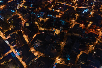 Illuminated streets in the old district aerial