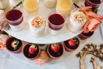 Assortment of different little desserts in a cup.