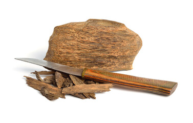 Agarwood, aloeswood, eaglewood or gharuwood. Piece of wood and shavings. Isolated.