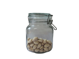 Pistachios are put in an airtight glass jar to preserve food. And can preserve food to extend the life of food on a white background.