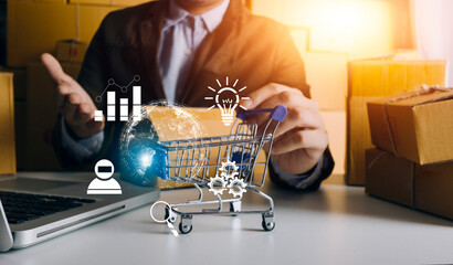 Entrepreneurs Small Business SME Independent men work at home Use smartphones and laptops for commercial checking, online marketing, packing boxes, SME sellers, concept, e-commerce team, online sales
